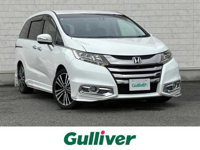 ホンダ オデッセイ アブソルート EX 山口県 2014(平26)年 8.4万km ホワイトオーキッドパール メモリナビ フルセグTV CD DVD BT/フリップダウンモニター/全周囲カメラ/両側パワースライドドア/あんしんパッケージ/・衝突被害軽減ブレーキ/・W サイド カーテン エアバッグ/ブラインドスポットモニタ/クルーズコントロール/ハーフレザーシート/パワーシート/パドルシフト/ドラレコ/ビルトインETC/スマートキー/LEDオートヘッドライト/フォグライト/ステアリングリモコン/禁煙車