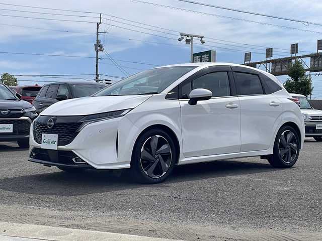 日産 オーラ G レザーエディション 徳島県 2022(令4)年 2.1万km ピュアホワイトパール 黒革シート/BOSEスピーカー/純正9インチナビ/アラウンドビューモニター/プロパイロット/シートヒーター/ステアリングヒーター/アダプティブLEDヘッドライト/オートハイビーム/エマージェンシーブレーキ/前後コーナーセンサー/HDMI/置くだけ充電/純正ドライブレコーダー/ETC2.0/スペアキー/純正17AW/純正フロアマット