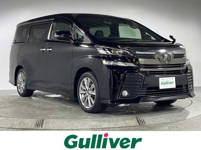 トヨタ ヴェルファイア Z Aエディション ゴールデンアイズ 福岡県 2016(平28)年 3.2万km バーニングブラッククリスタルシャインガラスフレーク 禁煙車/Wサンルーフ/純正９インチメモリナビ/・CD/DVD/BT/フルセグTV/・バックモニター/レーダークルーズコントロール/両側パワースライドドア/パワーバックドア/コーナーセンサー/ハーフレザーシート/ETC2.0/ウッドコンビハンドル/・ステアリングリモコン/ブレーキホールド/キセノンライト/・オートライト/・フォグランプ