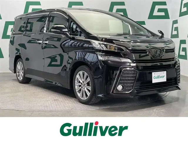 トヨタ ヴェルファイア Z Aエディション ゴールデンアイズ 鹿児島県 2016(平28)年 3.2万km バーニングブラッククリスタルシャインガラスフレーク 禁煙車/Wサンルーフ/純正９インチメモリナビ/・CD/DVD/BT/フルセグTV/・バックモニター/レーダークルーズコントロール/両側パワースライドドア/パワーバックドア/コーナーセンサー/ハーフレザーシート/ETC2.0/ウッドコンビハンドル/・ステアリングリモコン/ブレーキホールド/キセノンライト/・オートライト/・フォグランプ
