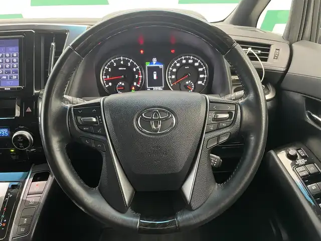トヨタ ヴェルファイア Z Aエディション ゴールデンアイズ 鹿児島県 2016(平28)年 3.2万km バーニングブラッククリスタルシャインガラスフレーク 禁煙車/Wサンルーフ/純正９インチメモリナビ/・CD/DVD/BT/フルセグTV/・バックモニター/レーダークルーズコントロール/両側パワースライドドア/パワーバックドア/コーナーセンサー/ハーフレザーシート/ETC2.0/ウッドコンビハンドル/・ステアリングリモコン/ブレーキホールド/キセノンライト/・オートライト/・フォグランプ