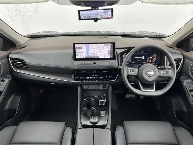 日産 エクストレイル G e－4ORCE 大分県 2024(令6)年 0.2万km ダイヤモンドブラック 純正１２．３インチナビ　/（Bluetooth/フルセグTV/USB端子/CarPlay）　/駐車支援（プロパイロットパーキング）/アラウンドビューモニター　/プロパイロット　/１００Ｖ電源　　/ビルトインETC2.0　/デジタルインナーミラー/LEDライト/電動リアゲード/前席パワーシート/運転席ポジションメモリー/各席シートヒーター/ステアリングヒーター/ステアリングスイッチ/オートブレーキホールド/保証書/スペアキー/純正アルミホイール