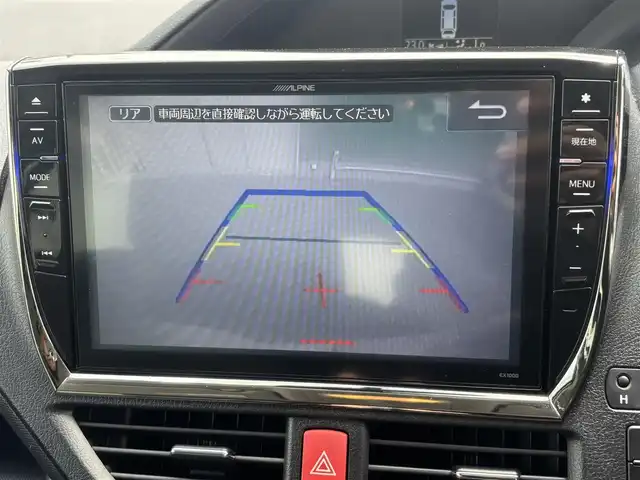 トヨタ ヴォクシー ZS 福岡県 2014(平26)年 8.9万km ホワイトパールクリスタルシャイン １６インチアルミホイール/両側パワースライドドア　/純正ＥＴＣ　/ＬＥＤヘッドライト　/アルパインビッグナビ　/フルセグTV/純正フロアマット　/プッシュスタートスイッチ　/クルーズコントロール/横滑り防止装置/オートライト/アルパイン製後席用モニター/ダブルゾーン/アイドリングストップ/レザー調シートカバー/スマートキー