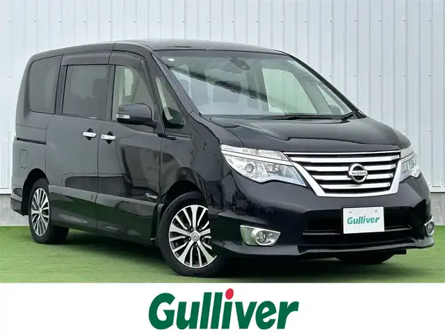 日産 セレナ ハイウェイスター S HV Vセレ 香川県 2015(平27)年 6.8万km ダイヤモンドブラック 登録時走行距離：67581km/純正SDナビゲーション/→CD/DVD再生/バックカメラ/フリップ/ビルトインETC/ステアリングリモコン/クルーズコントロール/両側パワースライドドア/LEDオートライト/フォグランプ/純正16インチアルミホイール/純正フロアマット/スマートキー/スペアキー