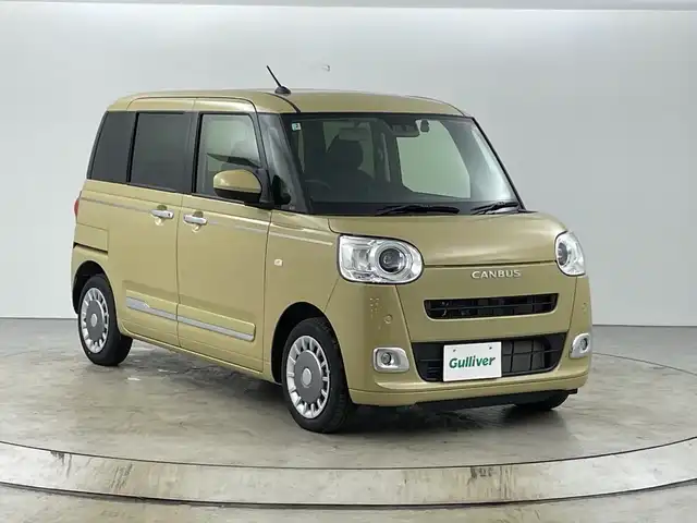 ダイハツ ムーヴ キャンバス セオリー G ターボ 愛知県 2025(令7)年 0.4万km サンドベージュメタリック 純正7インチナビ/(フルセグTV/Bluetooth/DVD再生)/バックカメラ/HDMI入力端子/スマートアシスト/・衝突回避支援ブレーキ/・車線逸脱警報/・レーンキープ/・アダプティブクルーズコントロール/両側パワースライドドア/フルLEDヘッドランプ/保温機能付きカップホルダー（前席）/ステアリングスイッチ/前席シートヒーター/電動パーキングブレーキ/オートホールド