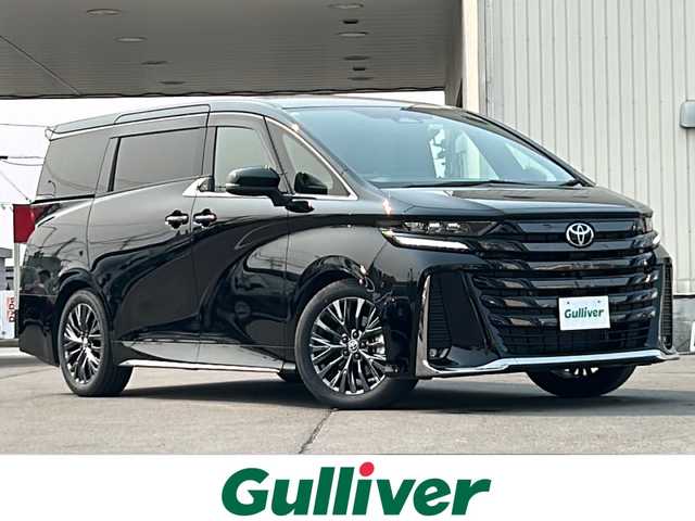 トヨタ ヴェルファイア ハイブリット Z プレミア 道北・旭川 2025(令7)年 0.2万km ブラック ・ワンオーナー/・純正ナビ/BT/DTV/Miracast/USB/HDMI/・純正フリップダウンモニター/・ガラスルーフ/・ブラウンレザーシート/・禁煙車/・AC100V/・両側パワースライドドア/・パワーバックドア/・パーキングアシスト/・ウッドコンビステアリング/・全方位カメラ/・電動サイドシェイド/・パワーシート/・シートヒーター/・エアシート/・３眼LEDヘッドライト/・デジタルインナーミラー/・TSS/プリクラッシュセーフティ/LTA/LDA/レーダークルーズコントロール/AHB/RSA/ドライバー異常時対応システム/・スマートキー×２/・純正ETC２．０/・ステアリングヒーター/・純正１９インチAW/・社外１７インチアルミ冬タイヤ積込/・防水フロアマット/・ドアバイザー