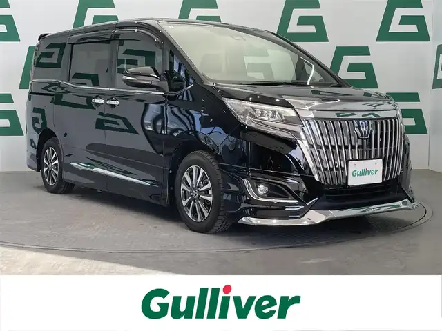 トヨタ エスクァイア ハイブリッド Gi 鹿児島県 2020(令2)年 5.1万km 黒 禁煙車/純正SDナビ【NSZT-Y68T】/ (Bluetooth/フルセグTV)/バックモニター/フリップダウンモニター/両側パワースライドドア/ビルトインETC/モデリスタ/トヨタセーフティセンス