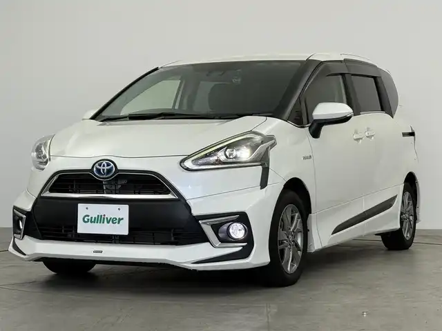 トヨタ シエンタ ハイブリッド G クエロ 愛知県 2017(平29)年 8.1万km ホワイトパールクリスタルシャイン トヨタセーフティーセンス　/・レーンディパラーチャー　/・衝突軽減ブレーキ　/・AUTOハイビーム　/・先行車発進告知機能/両側パワースライドドア/モデリスタエアロ　/純正SDナビ　/フルセグTV/Bluetooth　/ステアリングリモコン　/バックモニター　/純正AW/スマートキー　/LEDヘッドライト　/ビルトインETC　/革巻きステアリング　/ハーフレザーシート　/7人乗り/フォグランプ　