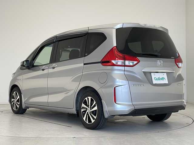 ホンダ フリード＋ ハイブリット EX 愛知県 2017(平29)年 6.4万km ルナシルバーM 衝突軽減システム/純正9型ナビ/両側パワースライドドア/クルーズコントロール/シートヒーター/CD DVD/Bluetooth/バックカメラ/コーナーセンサー/純正アルミホイール/LEDヘッドライト/オートライト/ETC/ステアリングスイッチ/スマートキー/プッシュスタート