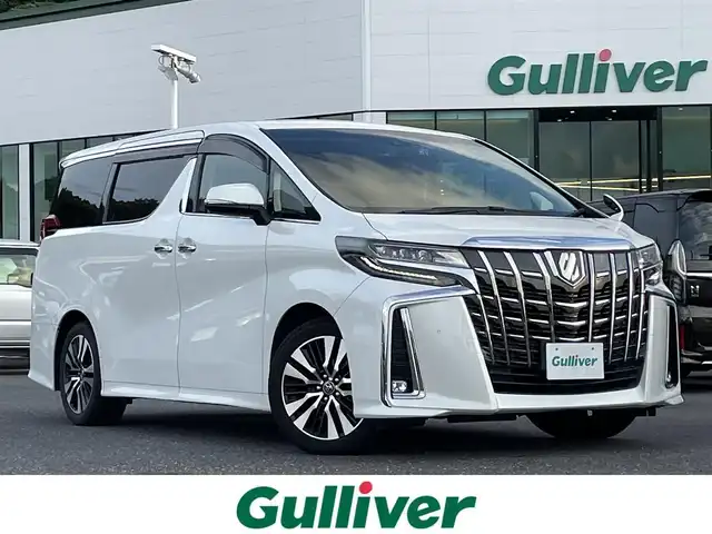トヨタ アルファード S Cパッケージ 島根県 2018(平30)年 8.9万km ホワイトパールクリスタルシャイン 登録時走行距離88781km/取扱説明書/保証書/アルパインナビ/フルセグテレビ/バックカメラ/プリクラッシュセーフティ/レーダークルーズコントロール/レーンキープアシススト/クリアランスソナー/パーキングサポート/両側パワースライドドア/パワーバックドア/黒革シート【シートヒーター/エアシート】/オットマンシート/ハンドルヒーター/デジタルインナーミラー/LEDヘッドライト/オートライト/ETC/純正18インチAW