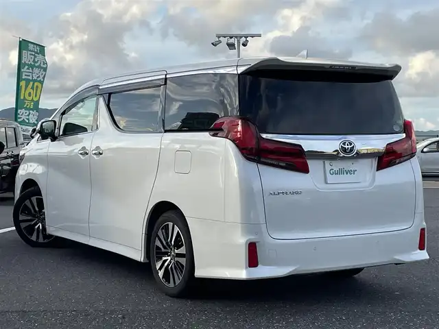 トヨタ アルファード S Cパッケージ 島根県 2018(平30)年 8.9万km ホワイトパールクリスタルシャイン 登録時走行距離88781km/取扱説明書/保証書/アルパインナビ/フルセグテレビ/バックカメラ/プリクラッシュセーフティ/レーダークルーズコントロール/レーンキープアシススト/クリアランスソナー/パーキングサポート/両側パワースライドドア/パワーバックドア/黒革シート【シートヒーター/エアシート】/オットマンシート/ハンドルヒーター/デジタルインナーミラー/LEDヘッドライト/オートライト/ETC/純正18インチAW