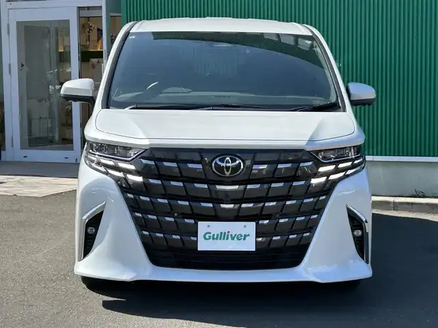 トヨタ アルファード Z 宮城県 2024(令6)年 1.3万km プラチナホワイトパールマイカ 左右独立ムーンルーフ/デジタルインナーミラー/＝＝＝/セーフティセンス/・プリクラッシュセーフティ/・レーントレーシングアシスト/・全車速追従機能付レーダークルーズコントロール/・アダプティブハイビームシステム/・ロードサインアシスト/・ドライバー異常時対応システム/・プロアクティブドライビングアシスト/・発進遅れ告知機能/BSM/パーキングサポートブレーキ/純正12インチフリップダウンモニター（V12T-R72C）/14インチディスプレイオーディオ/・車載ナビ/・地デジTV/・USB/HDMI/・AppleCarPlay/AndroidAuto/・ETC2.0/ワイヤレス充電/床下透過表示機能付パノラミックビューモニター/バックカメラ洗浄機能/社外前後ドライブレコーダー/予約ロック機能付両側パワースライドドア/予約ロック機能付パワーバックドア/合皮シート/シートヒーター/ベンチレーション/ステアリングヒーター/3眼LEDヘッドランプ/フォグランプ/電動パーキングブレーキ/ブレーキホールド/純正18インチAW