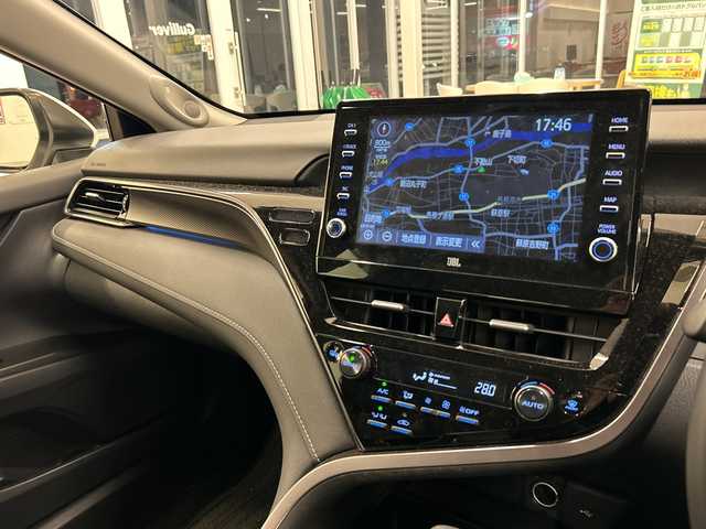 トヨタ カムリ 岐阜県 2021(令3)年 3.3万km プラチナホワイトパールマイカ 純正ナビ/トヨタセーフティーセンス/JBLプレミアムサウンドシステム/本革シート/バックカメラ/全方位カメラ/フルセグ/社外前方ドラレコ/BIuetooth/ETC2.0/USB入力端子/プッシュスタート/コーナーセンサー前後/パワーシート/シートヒーター運転席助手席/オートライト/オートマチックハイビーム/純正アルミホイール/LEDヘッドライト/レーンキープアシスト/MTモード付きAT/BSM/HUD/保証書/取扱説明書