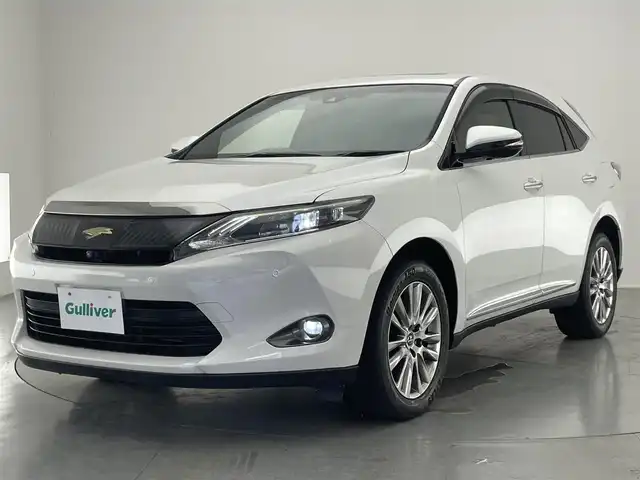 トヨタ ハリアー プレミアム アドバンスドP 愛知県 2014(平26)年 7.2万km ホワイトパールクリスタルシャイン メーカーオプションナビ（フルセグTv、BT、AM、FM）/JBLサウンド/全方位カメラ/LEDヘッドライト/サンルーフ/純正18インチアルミホイール/パワーバックドア/AUTOエアコン/アイドリングストップ/置くだけ充電/アイドリングストップ/追従クルーズコントロール/ビルトインETC/パワーステアリング/パワーウィンドウ/パワーシートD席/前後コーナーセンサー/スマートキー/プッシュスタート/カーテンエアバック