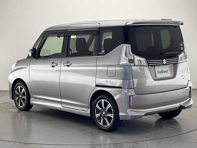 スズキ ソリオ バンディット HV MV 宮崎県 2019(令1)年 4.1万km プレミアムシルバーメタリック 禁煙車/衝突被害軽減ブレーキ/純正8型ナビTV/（Panasonic/CN-RZ843/CD/DVD/Bluetooth/フルセグTV)/純正バックカメラ/純正ビルトインETC/純正LEDオートライト/純正フォグ/純正エアロ/純正ルーフエンドスポイラー/純正15インチアルミ/純正フロアマット/左側電動スライドドア/アダプティブクルーズコントロール/レーンディパーチャーアラート/クリアランスソナー/オートエアコン/ウインカードアミラー/シートヒーター/パドルシフト/本革巻ハンドル/スマートキー/プッシュエンジンスタート/新車時保証書/取扱い説明書