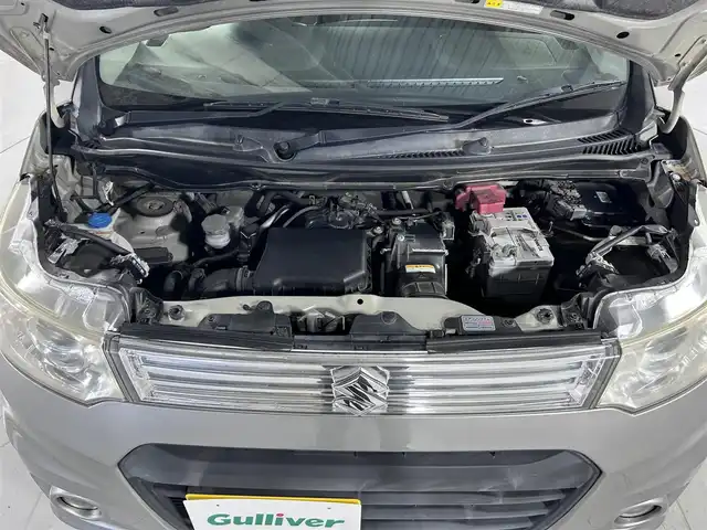 スズキ ワゴンＲ スティングレー T 佐賀県 2014(平26)年 14.9万km スチールシルバーM 社外7型ナビ/ＡＭ/ＦＭ/CD/DVD/Bluetooth/フルセグTV/バックカメラ/前後ドライブレコーダー/衝突被害軽減システム/HIDヘッドライト/フォグランプ/オートエアコン/盗難防止装置/横滑り防止装置/オートライト/スマートキー/プッシュスタート/樹脂フロアマット/純正15インチアルミホイール	/ステアリングスイッチ/電動格納ミラー/ドアバイザー