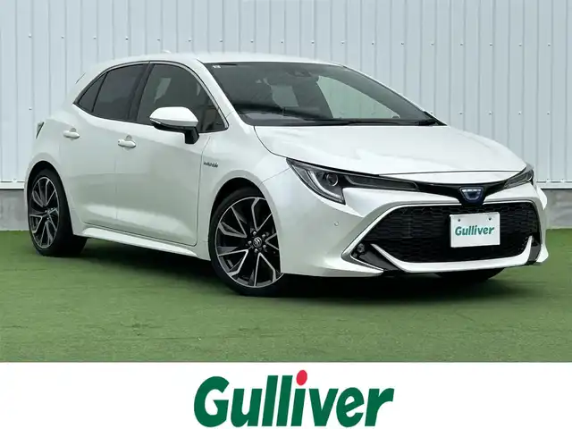 トヨタ カローラ スポーツ ハイブリッドG Z 香川県 2019(令1)年 4.1万km ホワイトパールクリスタルシャイン 純正９型ナビ/バックカメラ/レーダークルコン/前後コーナーセンサー/ヘッドアップディスプレイ/ドラレコ/ＢＳＭ/ＥＴＣ２．０/革巻きステアリング/ステアリングリモコン/ＬＥＤヘッドライト/フォグライト/純正ＡＷ/純正フロアマット
