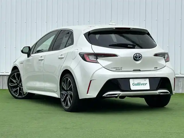 トヨタ カローラ スポーツ ハイブリッドG Z 香川県 2019(令1)年 4.1万km ホワイトパールクリスタルシャイン 純正９型ナビ/バックカメラ/レーダークルコン/前後コーナーセンサー/ヘッドアップディスプレイ/ドラレコ/ＢＳＭ/ＥＴＣ２．０/革巻きステアリング/ステアリングリモコン/ＬＥＤヘッドライト/フォグライト/純正ＡＷ/純正フロアマット