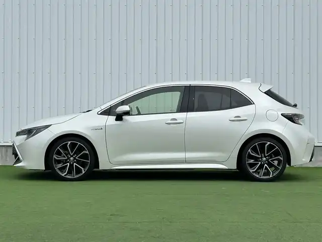 トヨタ カローラ スポーツ ハイブリッドG Z 香川県 2019(令1)年 4.1万km ホワイトパールクリスタルシャイン 純正９型ナビ/バックカメラ/レーダークルコン/前後コーナーセンサー/ヘッドアップディスプレイ/ドラレコ/ＢＳＭ/ＥＴＣ２．０/革巻きステアリング/ステアリングリモコン/ＬＥＤヘッドライト/フォグライト/純正ＡＷ/純正フロアマット