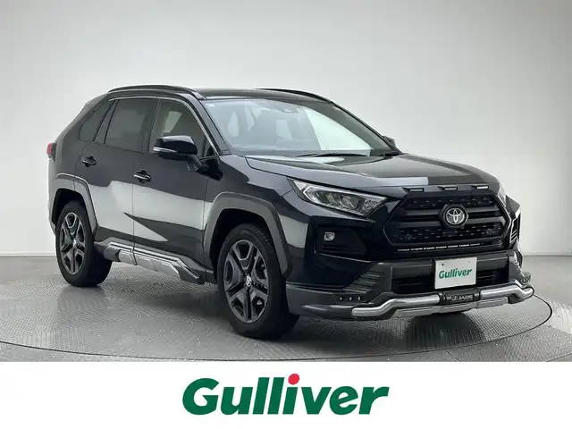 トヨタ ＲＡＶ４ アドベンチャー 兵庫県 2022(令4)年 3.2万km アティチュードブラックマイカ ・純正ディスプレイオーディオ/・純正メモリナビ/・ＪＡＯＳスポイラー/・バックカメラ/・ビルドインＥＴＣ２．０/・ドラレコ内臓デジタルインナーミラー/・スライディングガラスルーフ/・４ＷＤ/・ＬＥＤヘッドライト/・ＬＥＤフォグランプ/・オートライト/・オートハイビーム/・前後コーナーセンサー/・衝突軽減ブレーキ/・レーンキープアシスト/・追従クルーズコントロール/・ブラインドスポットモニター/・ステアリングヒーター/・シートヒーターD/N/・エアシートD/N/・レザーシート/・パワーシートD席のみ/・純正フロアマット/・純正19インチアルミホイール/・スマートキー/・スペアキー1本