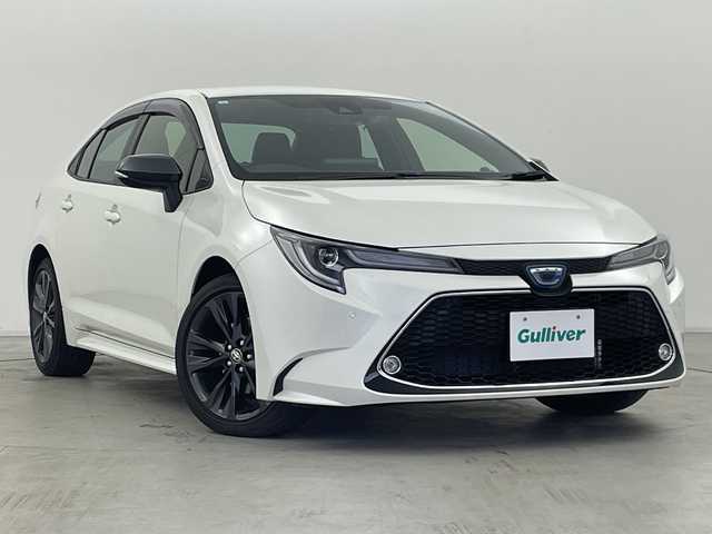 トヨタ カローラ ハイブリット ダブルバイビー 群馬県 2021(令3)年 0.3万km ホワイトパールクリスタルシャイン 純正８型ナビ　バックカメラ　ＢＳＭ　ビルトインＥＴＣ２．０　前後ドラレコ　ハーフレザーシート　シートヒーター　衝突被害軽減ブレーキ　レーンアシスト　アダプティブクルーズコントロール　LEDライト　禁煙