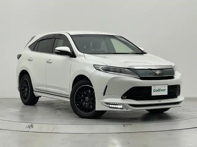 トヨタ ハリアー プレミアム 宮城県 2017(平29)年 6.3万km ホワイトパールクリスタルシャイン 9インチ純正ナビ(NSZT-Y66T)/フルセグTV/FM/AM/BT/CD/バックカメラ/クルーズコントロール/ビルトインETC2.0/ドライブレコーダー/デジタルインナーミラー/パワーシート/電動リアゲート/オートホールド/電動パーキング/横滑り防止装置/レーンキープアシスト/衝突被害軽減システム/オートマチックハイビーム/フォグランプ/TRDエアロ