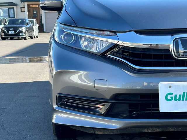 ホンダ シャトル G ホンダセンシング 道北・旭川 2020(令2)年 7万km シャイニンググレーM /４WD//禁煙車//寒冷地仕様//ワンオーナー//社外ナビ//CD/DVD/SD/USB/iPod/フルセグTV/BT//純正エンジンスターター//バックカメラ//衝突軽減ブレーキ//誤発進抑制機能//路外逸脱抑制機能//車線維持支援システム//歩行者事故低減ステアリング//アダプティブクルーズコントロール//ステアリングスイッチ//リアヒーター//ワイパーデアイサー//オートライト//純正フロアマット//ビルトインETC//スチールホイール冬タイヤ積込//スペアキー//保証書//取扱説明書