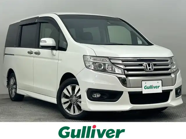 ホンダ ステップワゴン スパーダ Z クールスピリット 道央・札幌 2012(平24)年 3.9万km ホワイトオーキッドパール ・４WD/・コンフォートビューパッケージ/・純正メーカーナビ/　CD/DVD/HDD/USB/ワンセグ/・バックカメラ/・アルパインフリップダウンモニター/・ビルトインETC/・クルーズコントロール/・アクティブコーナリングライト/・両側パワースライドドア/・ハーフレザーシート/・キセノンライト/・オートライト/・スマートキー/・純正フロアマット/・ドアバイザー