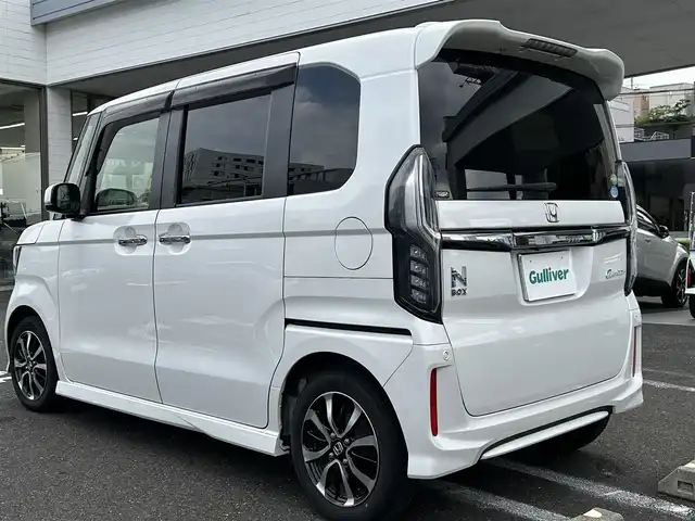 ホンダ Ｎ ＢＯＸ カスタム G L ホンダセンシング 長崎県 2018(平30)年 5.2万km プラチナホワイトパール ・プッシュスタート/・純正SDナビ（AM/FM/TV/CD/DVD/SD）/・ハンドルスイッチ/・ブルートゥース/・クルーズコントロール（追従機能有）/・ETC/・USB×２/・バックカメラ/・片側パワースライドドア/・オートライト/・LEDライト/・横滑り防止装置/・衝突軽減システム/・レーンキープアシスト/・車線逸脱警報装置