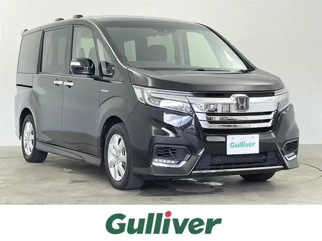 ホンダ ステップワゴン スパーダ ハイブリッド G ホンダセンシング 千葉県 2018(平30)年 6.1万km プレミアムスパークルブラックパール ホンダセンシング/・衝突軽減ブレーキ/・先行車発進お知らせ/・路外逸脱抑制システム/・レーンキープアシスト/社外8インチメモリナビ/CD DVD BT フルセグ/バックカメラ/両側パワースライドドア/レーダークルーズコントロール/LEDオートライト/純正16インチアルミホイール/パーキングスイッチ/ブレーキホールド/わくわくゲート/プッシュスタート/スマートキー/ETC