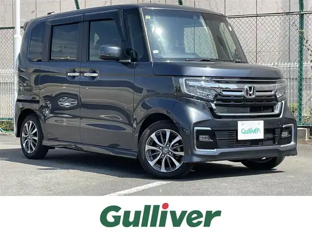 ホンダ Ｎ ＢＯＸ カスタム L 東京都 2023(令5)年 1.5万km メテオロイドグレーメタリック 衝突軽減システム/社外SDナビ/レーダークルーズコントロール/シートヒーター/CD/DVD/バックカメラ/コーナーセンサー/片側電動スライドドア/純正アルミホイール/LEDヘッドライト/オートマチックハイビーム/ステアリングスイッチ/スマートキー/プッシュスタート