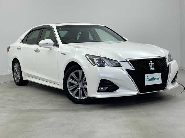 トヨタ クラウン ハイブリッド アスリートS 新潟県 2015(平27)年 13.3万km ホワイトパールクリスタルシャイン サンルーフ/純正メモリナビ/　フルセグTV/Bluetooth/CD/DVD/USB/クルーズコントロール/前席パワーシート/前席シートヒーター/ドライブレコーダー/バックモニター/ビルトインETC/横滑り防止装置/ステアリングヒーター/レザーステアリング/ステアリングスイッチ