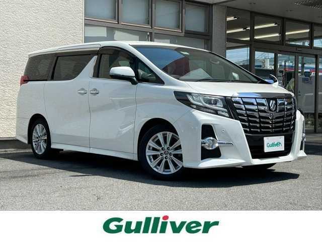 トヨタ アルファード S Aパッケージ 大阪府 2015(平27)年 9.2万km ホワイトパールクリスタルシャイン ワンオーナー/ALPINE11型ナビ/（フルセグ/BT/CD/DVD）/ALPINE11型フリップダウンモニター/バックカメラ/両側パワースライドドア/クルーズコントロール/横滑り防止システム/前後コーナーセンサー/純正18インチAW/プッシュスタート/オートライト/保証書/取扱説明書/スペアキー　有