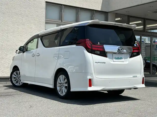 トヨタ アルファード S Aパッケージ 大阪府 2015(平27)年 9.2万km ホワイトパールクリスタルシャイン ワンオーナー/ALPINE11型ナビ/（フルセグ/BT/CD/DVD）/ALPINE11型フリップダウンモニター/バックカメラ/両側パワースライドドア/クルーズコントロール/横滑り防止システム/前後コーナーセンサー/純正18インチAW/プッシュスタート/オートライト/保証書/取扱説明書/スペアキー　有