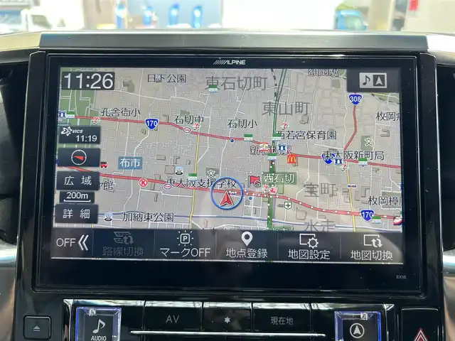 トヨタ アルファード S Aパッケージ 大阪府 2015(平27)年 9.2万km ホワイトパールクリスタルシャイン ワンオーナー/ALPINE11型ナビ/（フルセグ/BT/CD/DVD）/ALPINE11型フリップダウンモニター/バックカメラ/両側パワースライドドア/クルーズコントロール/横滑り防止システム/前後コーナーセンサー/純正18インチAW/プッシュスタート/オートライト/保証書/取扱説明書/スペアキー　有