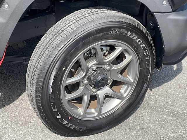 スズキ ジムニー XC 長野県 2025(令7)年 0.4万km ブルーイッシュブラックパール3 ４WD/スズキセーフティサポート /JAOSマッドフラップ/JAOSオーバーフェンダー/JAOSフロントブッシュバー/エンジンスターター/純正16インチアルミ/クルーズコントロール/コーナーセンサー /LEDヘッドライト/シートヒーター /ワンオーナー /保証書・取説・スペアキー