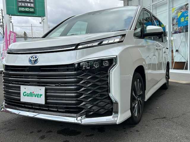 トヨタ ヴォクシー ハイブリッド S－Z 静岡県 2025(令7)年 0.3万km ホワイトパールクリスタルシャイン ワンオーナー/純正ナビ（フルセグTV・BT・FM・AM）/両側パワースライドドア/ブレーキホールド/EPD/ドライブモード/EVモード/シートヒーター/ハイブリッド/スペアキー１/アダプティブクルーズコントロール/純正アルミホイール/オートマチックハイビーム/車載音声アシスタント/デジタルインナーミラー/ウォークスルー/取扱説明書/保障証