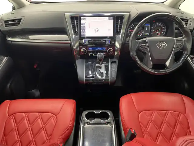 トヨタ ヴェルファイア Z Aエディション 福井県 2018(平30)年 5.8万km ダークレッドマイカメタリック サンルーフ/アルパインナビ/【AM/FM/CD/DVD/Bluetooth/フルセグTV】/アルパインフリップダウンモニター/バックカメラ/ETC/衝突軽減ブレーキ/車線逸脱警報機能/クルーズコントロール（追従有）/オートライト/オートハイビーム/LEDヘッドライド/LEDフォグライド/プッシュスタート/スマートキー/電動サイドブレーキ/ブレーキホールド機能/シートカバー/社外21インチアルミホイール/（純正ホイール車載）/社外マフラー/（純正マフラー車載）