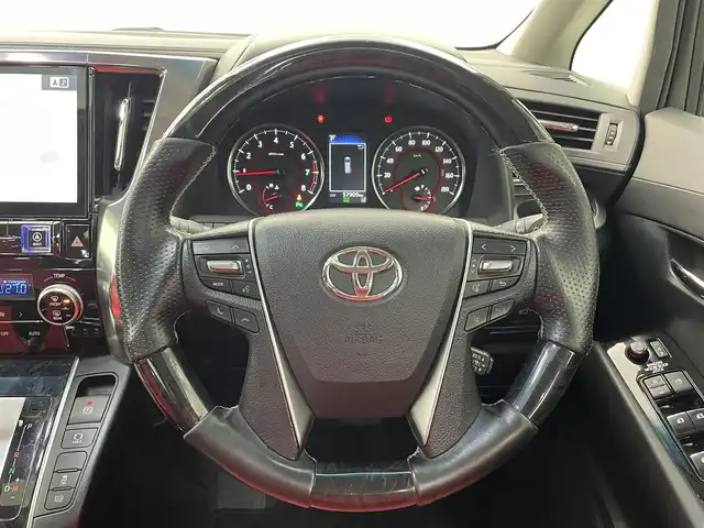 トヨタ ヴェルファイア Z Aエディション 福井県 2018(平30)年 5.8万km ダークレッドマイカメタリック サンルーフ/アルパインナビ/【AM/FM/CD/DVD/Bluetooth/フルセグTV】/アルパインフリップダウンモニター/バックカメラ/ETC/衝突軽減ブレーキ/車線逸脱警報機能/クルーズコントロール（追従有）/オートライト/オートハイビーム/LEDヘッドライド/LEDフォグライド/プッシュスタート/スマートキー/電動サイドブレーキ/ブレーキホールド機能/シートカバー/社外21インチアルミホイール/（純正ホイール車載）/社外マフラー/（純正マフラー車載）