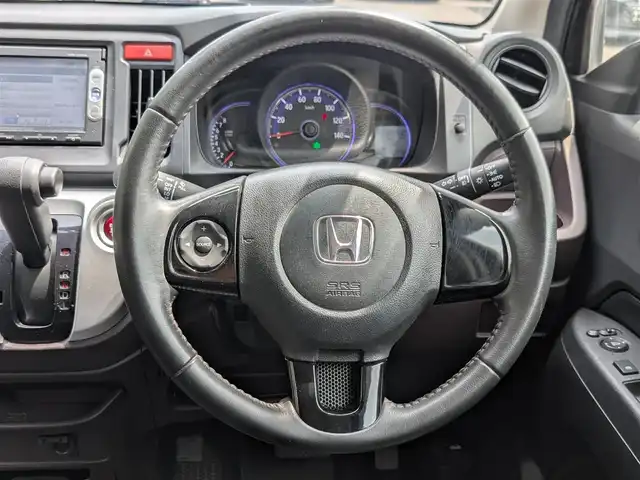 ホンダ Ｎ ＷＧＮ カスタム G 栃木県 2015(平27)年 8.9万km スマートブラック (株)IDOMが運営する【じしゃロン宇都宮店】の自社ローン対象車両になります。こちらは現金またはオートローンご利用時の価格です。自社ローンご希望の方は別途その旨お申付け下さい。/社外ナビ/(CD／DVD／Bluetooth／ワンセグTV)/バックカメラ/横滑り防止装置/アイドリングストップ/ベンチシート/オートライト/電動格納ミラー/純正　１４インチAW/プッシュスタート/スマートキー/フロアマット(社外)/スペアキー/ＡＡＣ