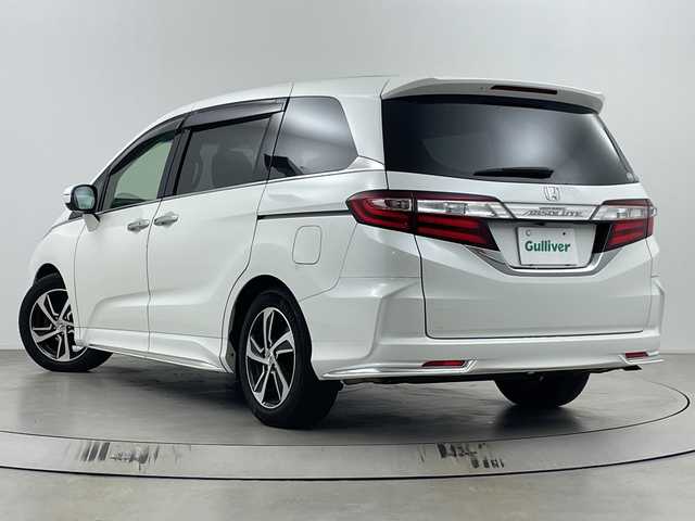 ホンダ オデッセイ アブソルート・Xホンダセンジング 埼玉県 2017(平29)年 8.4万km ホワイトオーキッドパール 後席純正モニター /純正ナビ　/全方位カメラ /ワンセグＴＶ /パーキングアシスト/純正ドラレコ /ビルトインETC/追従クルーズコントロール /レーンキープアシスト /衝突被害軽減システム/両側パワースライドドア/パワーシート/オートライト  /オットマン /純正フロアマット/純正アルミホイール