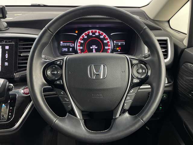 ホンダ オデッセイ アブソルート・Xホンダセンジング 埼玉県 2017(平29)年 8.4万km ホワイトオーキッドパール 後席純正モニター /純正ナビ　/全方位カメラ /ワンセグＴＶ /パーキングアシスト/純正ドラレコ /ビルトインETC/追従クルーズコントロール /レーンキープアシスト /衝突被害軽減システム/両側パワースライドドア/パワーシート/オートライト  /オットマン /純正フロアマット/純正アルミホイール