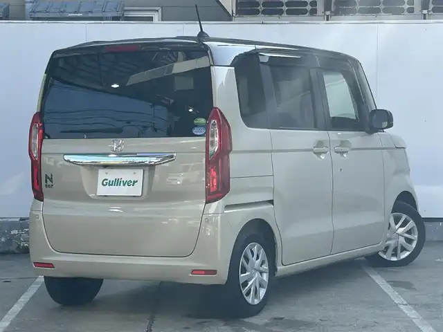 ホンダ Ｎ ＢＯＸ G L ホンダセンシング 青森県 2019(令1)年 9.4万km プレミアムアイボリーパールⅡ 寒冷地仕様/社外ナビ/フルセグTVAM/FM/CD/DVD/BT/片側パワースライド/コーナーセンサー/ベンチシート/クルーズコントロール/レーンアシスト/横滑り防止機能/車線逸脱警報/衝突軽減ブレーキ/アイドリングストップ/オートライト/ヒルスタートアシスト/盗難防止装置/UVカットガラス/プライバシーガラス/ETC/スペアキー/保証書/取扱説明書