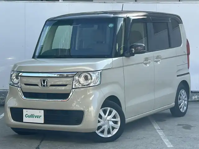 ホンダ Ｎ ＢＯＸ G L ホンダセンシング 青森県 2019(令1)年 9.4万km プレミアムアイボリーパールⅡ 寒冷地仕様/社外ナビ/フルセグTVAM/FM/CD/DVD/BT/片側パワースライド/コーナーセンサー/ベンチシート/クルーズコントロール/レーンアシスト/横滑り防止機能/車線逸脱警報/衝突軽減ブレーキ/アイドリングストップ/オートライト/ヒルスタートアシスト/盗難防止装置/UVカットガラス/プライバシーガラス/ETC/スペアキー/保証書/取扱説明書