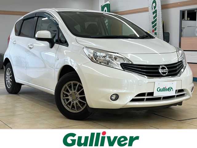 日産 ノート X FOUR エマージェンシーB 道央・札幌 2014(平26)年 12.9万km ブリリアントホワイトパール ・ワンオーナー/・4WD/・純正ナビ/フルセグTV/CD/SD/・バックカメラ/・純正エンジンスターター/・ドライブレコーダー/・エマージェンシーブレーキ/・車線逸脱警報/・横滑り防止/・フロントフォグ/・プッシュスタート/・インテリジェントキー/・ドアバイザー/・電格ミラー/・冬タイヤ14インチホイル積込