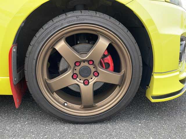 スズキ スイフト スポーツ 山口県 2015(平27)年 7.1万km チャンピオンイエロー 禁煙車/社外マフラー/社外１７インチアルミホイール/社外テールレンズ/社外カーボンリアスポイラー/運転席ＲＥＣＡＲＯシート/社外ナビ/Ｂｌｕｅｔｏｏｔｈ/フルセグＴＶ/バックカメラ/前後ドライブレコーダー/キセノンライト/オートライト/フォグライト/スマートキー＆プッシュスタート/クルーズコントロール/パドルシフト/保証書・取説