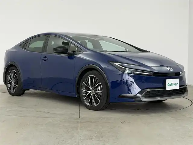 トヨタ プリウス Z 愛知県 2023(令5)年 1.6万km ダークブルー 純正12．3型ディスプレイオーディオ/（BT/TV/CD/AM/FM/miracast）/全方位カメラ/トヨタセーフティセンス/・プリクラッシュセーフティ/・レーダークルーズコントロール/・オートハイビーム/・レーントレーシングアシスト/BSM/メモリ付パワーシート/レザーシート/シートヒーター/エアシート/ハンドルヒーター/パワーバックドア/ビルトイン2.0ETC/デジタルインナーミラー/AC100V/オートホールド/LEDライト