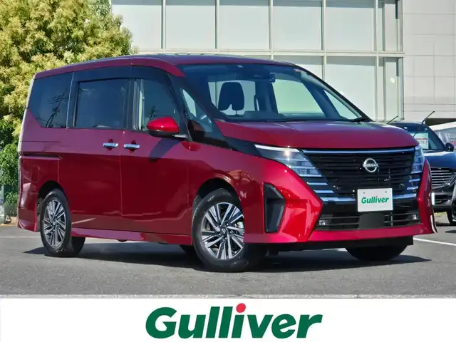 日産 セレナ ハイウェイスター V 鹿児島県 2023(令5)年 2万km 赤 プロパイロット　/純正ナビ　/ＥＴＣ　/両側パワースライドドア　/前後コーナーセンサー　/前方ドライブレコーダー　/Ｂｌｕｅｔｏｏｔｈオーディオ　/フルセグテレビ　/バックカメラ/LEDヘッドライト/横滑り防止装置/レーンキープアシスト/プッシュスタート/スマートキー/エアバッグ(W+サイド)/カーテンエアバッグ/純正アルミホイール(16インチ)