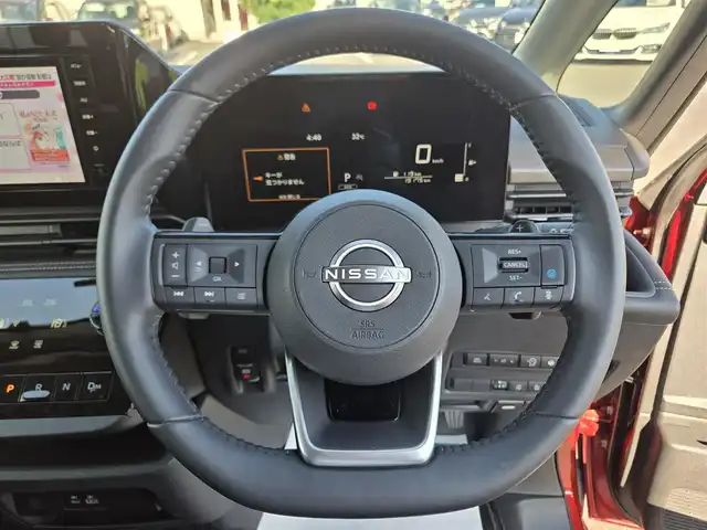 日産 セレナ ハイウェイスター V 鹿児島県 2023(令5)年 2万km 赤 プロパイロット　/純正ナビ　/ＥＴＣ　/両側パワースライドドア　/前後コーナーセンサー　/前方ドライブレコーダー　/Ｂｌｕｅｔｏｏｔｈオーディオ　/フルセグテレビ　/バックカメラ/LEDヘッドライト/横滑り防止装置/レーンキープアシスト/プッシュスタート/スマートキー/エアバッグ(W+サイド)/カーテンエアバッグ/純正アルミホイール(16インチ)