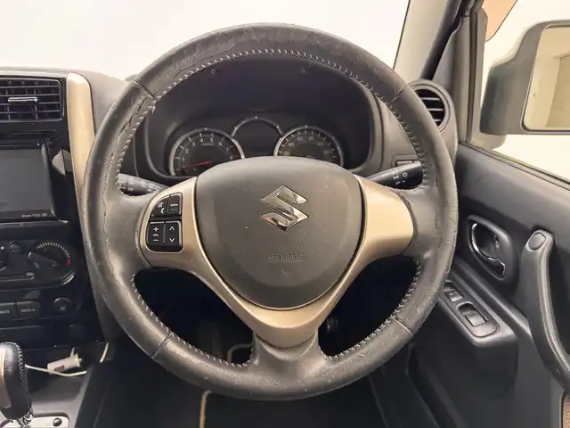 スズキ ジムニー ランドベンチャー 兵庫県 2016(平28)年 5.7万km ブルーイッシュブラックパール3 社外ナビ（ＤＶＤ／ＳＤ／ＢＴ／ワンセグ）/純正ＡＷ16インチ/純正フロアマット/シートヒーター（Ｄ席）/合皮シート/背面タイヤ/４ＷＤ/フォグランプ/電動格納ミラー/ウインカーミラー